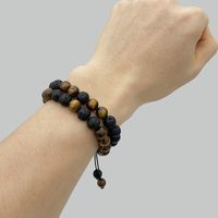 Casual Simple Style Round Volcanic Rock Tiger Eye Beaded Bracelets main image 2