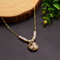 Retro Round Freshwater Pearl Copper Inlay Pearl 18k Gold Plated Pendant Necklace main image 1