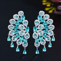 1 Pair Glam Wedding Shiny Round Peacock Feather Plating Hollow Out Inlay Copper Zircon Ear Studs main image 1
