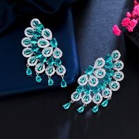 1 Pair Glam Wedding Shiny Round Peacock Feather Plating Hollow Out Inlay Copper Zircon Ear Studs main image 5