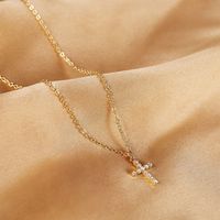 Acero Titanio Chapados en oro de 18k Elegante Ropa De Calle Enchapado Embutido Cruzar Circón Collar Colgante main image 1