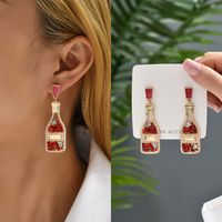 1 Pair Retro Luxurious Wine Bottle Plating Hollow Out Inlay Zinc Alloy Artificial Pearls Rhinestones Drop Earrings main image 9