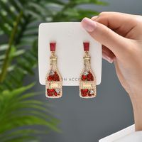1 Pair Retro Luxurious Wine Bottle Plating Hollow Out Inlay Zinc Alloy Artificial Pearls Rhinestones Drop Earrings main image 4