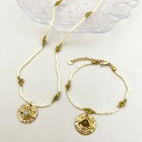 304 Stainless Steel Beaded Gold Plated Casual Simple Style Plating Inlay Round Flower Natural Stone Crystal Beads Bracelets Necklace main image 1