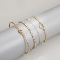 Estilo Ig Forma De Corazón Nudo Aleación Perla Enchapado Embutido Diamantes De Imitación Mujeres Pulsera Brazalete main image 3