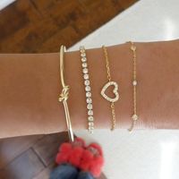 Estilo Ig Forma De Corazón Nudo Aleación Perla Enchapado Embutido Diamantes De Imitación Mujeres Pulsera Brazalete sku image 1