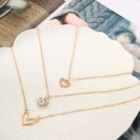 Estilo Ig Estrella Luna Forma De Corazón Aleación Ahuecar Embutido Diamantes De Imitación Mujeres Collar De Tres Capas main image 3