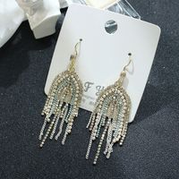 1 Pair Exaggerated Sweet U Shape Tassel Inlay Metal Artificial Pearls Rhinestones Drop Earrings sku image 1