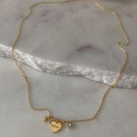 Acero Titanio Chapados en oro de 18k Estilo Simple Carta Forma De Corazón Embutido Circón Collar Colgante main image 5