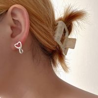 1 Pair Simple Style Solid Color Asymmetrical Chain Copper Ear Studs main image 3