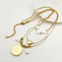 304 Stainless Steel Gold Plated IG Style Simple Style Enamel Plating Sun Moon Heart Shape Shell Three Layer Necklace main image 3
