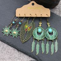 1 Set Retro Bohemian Round Water Droplets Flower Irregular Tassel Inlay Alloy Turquoise Drop Earrings main image 6