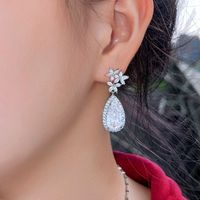 1 Pair Elegant Water Droplets Snowflake Plating Inlay Copper Artificial Gemstones Rhodium Plated Drop Earrings main image 3