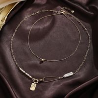 Baroque Style Bow Knot Copper Plating Inlay Freshwater Pearl 18k Gold Plated Silver Plated Pendant Necklace main image 4