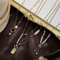 Baroque Style Bow Knot Copper Plating Inlay Freshwater Pearl 18k Gold Plated Silver Plated Pendant Necklace main image 3