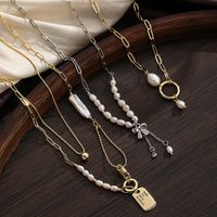 Baroque Style Bow Knot Copper Plating Inlay Freshwater Pearl 18k Gold Plated Silver Plated Pendant Necklace main image 1