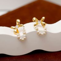 1 Pair Sweet Simple Style Bow Knot Plating Inlay Freshwater Pearl Copper Zircon 18k Gold Plated Earrings main image 1