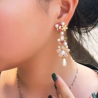 1 Pair Elegant Flower Plating Inlay Copper Artificial Pearls Artificial Diamond Rhodium Plated Silver Plated Drop Earrings main image 3