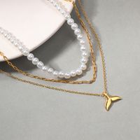 Glam Lady Simple Style Fish Tail Imitation Pearl Alloy Beaded Women's Layered Necklaces main image 3