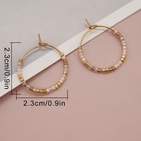 1 Pair Simple Style Solid Color Beaded Handmade Glass Hoop Earrings main image 3