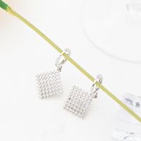 Wholesale Jewelry Simple Style Solid Color Rhombus Copper Alloy Artificial Rhinestones Zircon White Gold Plated Plating Hollow Out Inlay Drop Earrings main image 1