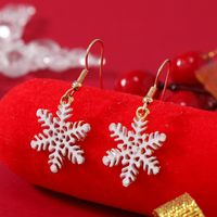 1 Pair Cute Snowflake Enamel Hollow Out Alloy Gold Plated Drop Earrings main image 2