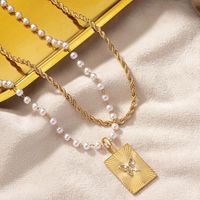Retro Lady Square Butterfly Imitation Pearl Alloy Beaded Plating Inlay Artificial Rhinestones 14k Gold Plated Women's Pendant Necklace main image 3