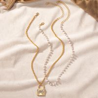 Retro Lady Square Butterfly Imitation Pearl Alloy Beaded Plating Inlay Artificial Rhinestones 14k Gold Plated Women's Pendant Necklace main image 7