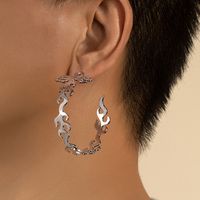1 Pair Simple Style Streetwear Cool Style Round Plating Hollow Out Alloy Silver Plated Earrings main image 1