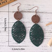 1 Pair Retro Leaves Hollow Out Pu Leather Wood Drop Earrings main image 2