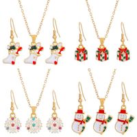 Christmas Classic Style Christmas Hat Christmas Tree Santa Claus Alloy Enamel Plating Inlay Artificial Rhinestones 18k Gold Plated Gold Plated Women's Earrings Necklace main image 3