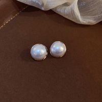 1 Pair Elegant Solid Color Plating Inlay Imitation Pearl Shell Zircon Drop Earrings sku image 1