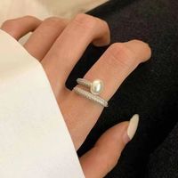 Simple Style Solid Color Imitation Pearl Inlay Artificial Diamond Women's Open Rings main image 3