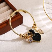 Elegant Luxurious Heart Shape Stainless Steel Alloy Beaded Hollow Out Inlay Rhinestones Wristband Bangle main image 3