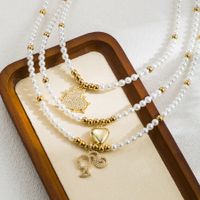 Ig Style Sweet Human Heart Shape Stainless Steel Shell Pearls Beaded Handmade Zircon 18k Gold Plated Women's Pendant Necklace main image 1