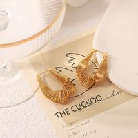 1 Pair IG Style Novelty British Style C Shape The Answer Twist Plating Braid Hollow Out Stainless Steel 18K Gold Plated Hoop Earrings main image 4