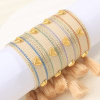 Simple Style Heart Shape Polyester Metal Embroidery Tassel Women's Drawstring Bracelets main image 2
