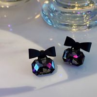 Wholesale Jewelry Cute Sweet Solid Color Bow Knot Metal Stoving Varnish Ear Studs main image 1