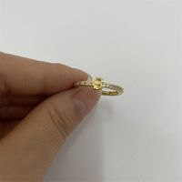 Süß Einfacher Stil Pendeln Brief Kupfer Überzug Inlay Zirkon 14 Karat Vergoldet Weißgold Plattiert Offener Ring sku image 1