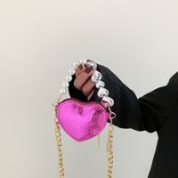 Women's Mini All Seasons Pu Leather Solid Color Vintage Style Heart-shaped Zipper Handbag main image 3