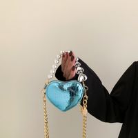 Frau Mini Alle Jahreszeiten Pu-leder Einfarbig Vintage-stil Herzförmig Reißverschluss Handtasche main image 2