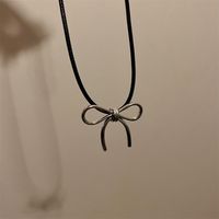 Japanese And Korean Sweet Cool Simple Pu Rope Line Bow Necklace Clavicle Chain Personalized Niche Design Necklace Sweater Chain For Women sku image 1