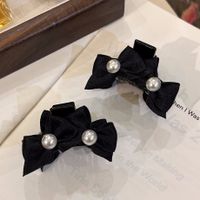 Women's Sweet Pearl Plastic Bowknot Hair Claws main image 2