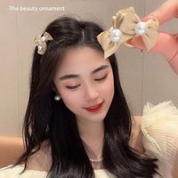 Women's Sweet Pearl Plastic Bowknot Hair Claws main image 4
