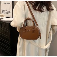 Women's Small Pu Leather Solid Color Vintage Style Oval Zipper Handbag sku image 1