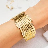 Vacation Modern Style Commute Leaf Flower Grain Stainless Steel Asymmetrical Metal Bangle main image 1
