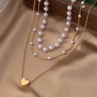 Elegant Einfacher Stil Herzform Kunststoff Zinklegierung Frau Dreilagige Halskette main image 4