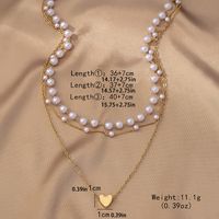 Elegant Einfacher Stil Herzform Kunststoff Zinklegierung Frau Dreilagige Halskette main image 2