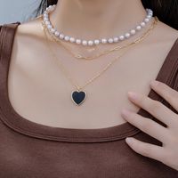 Simple Style Heart Shape Plastic Zinc Alloy Women's Three Layer Necklace sku image 1