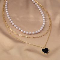 Simple Style Heart Shape Plastic Zinc Alloy Women's Three Layer Necklace main image 4